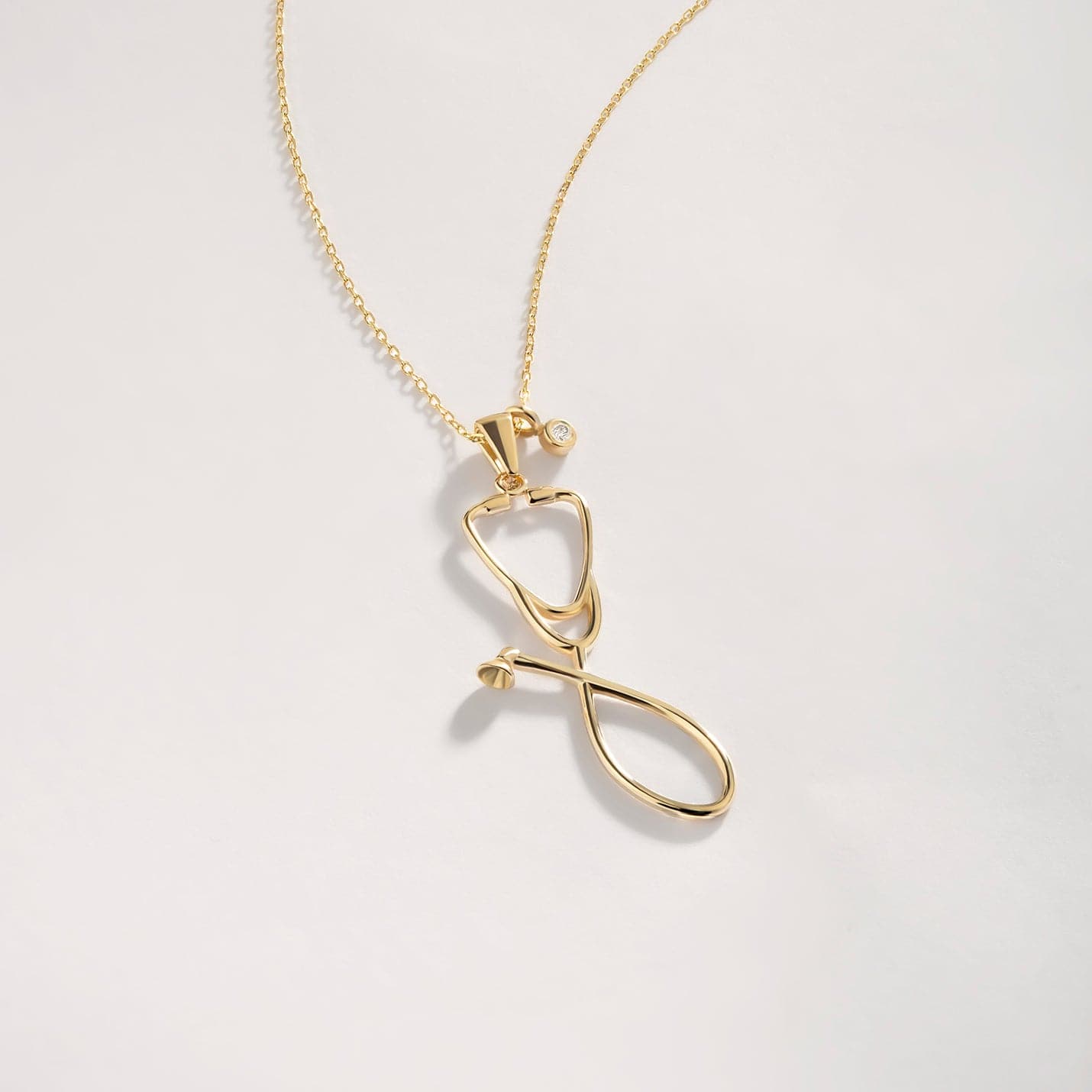 Diamond stethoscope necklace made of 585 solid gold