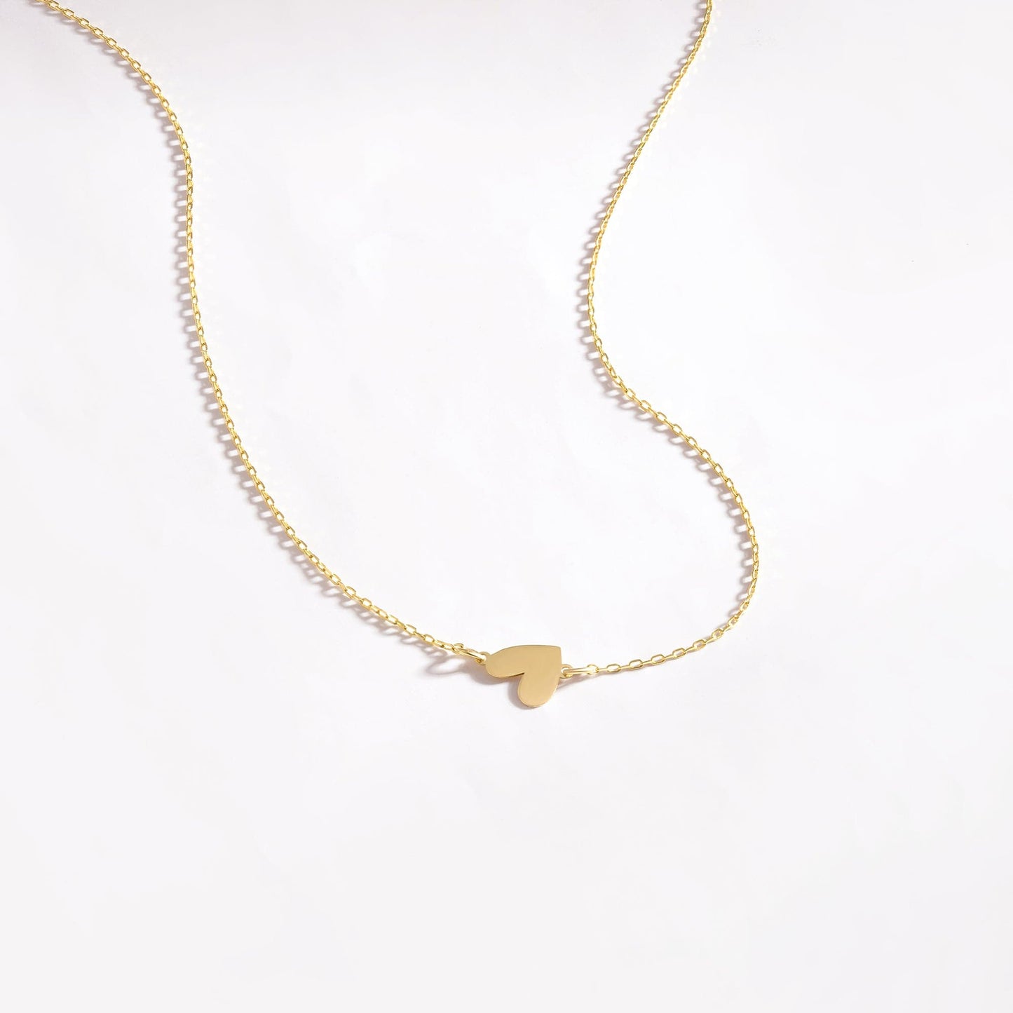 Collier cœur latéral en or massif 585