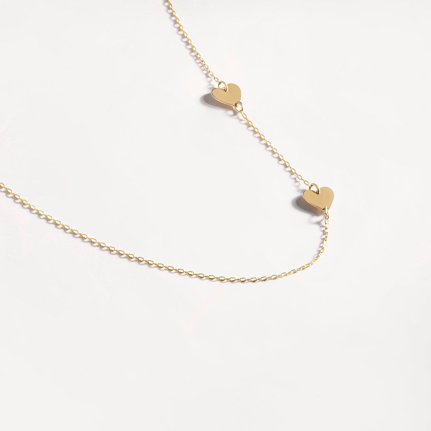 Two Side Hearts necklace made of 585 solid gold