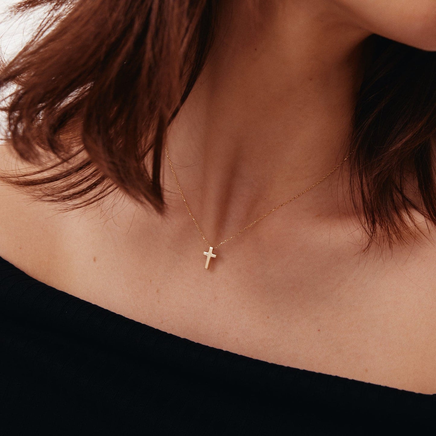 Tiny cross necklace made of 585 gold