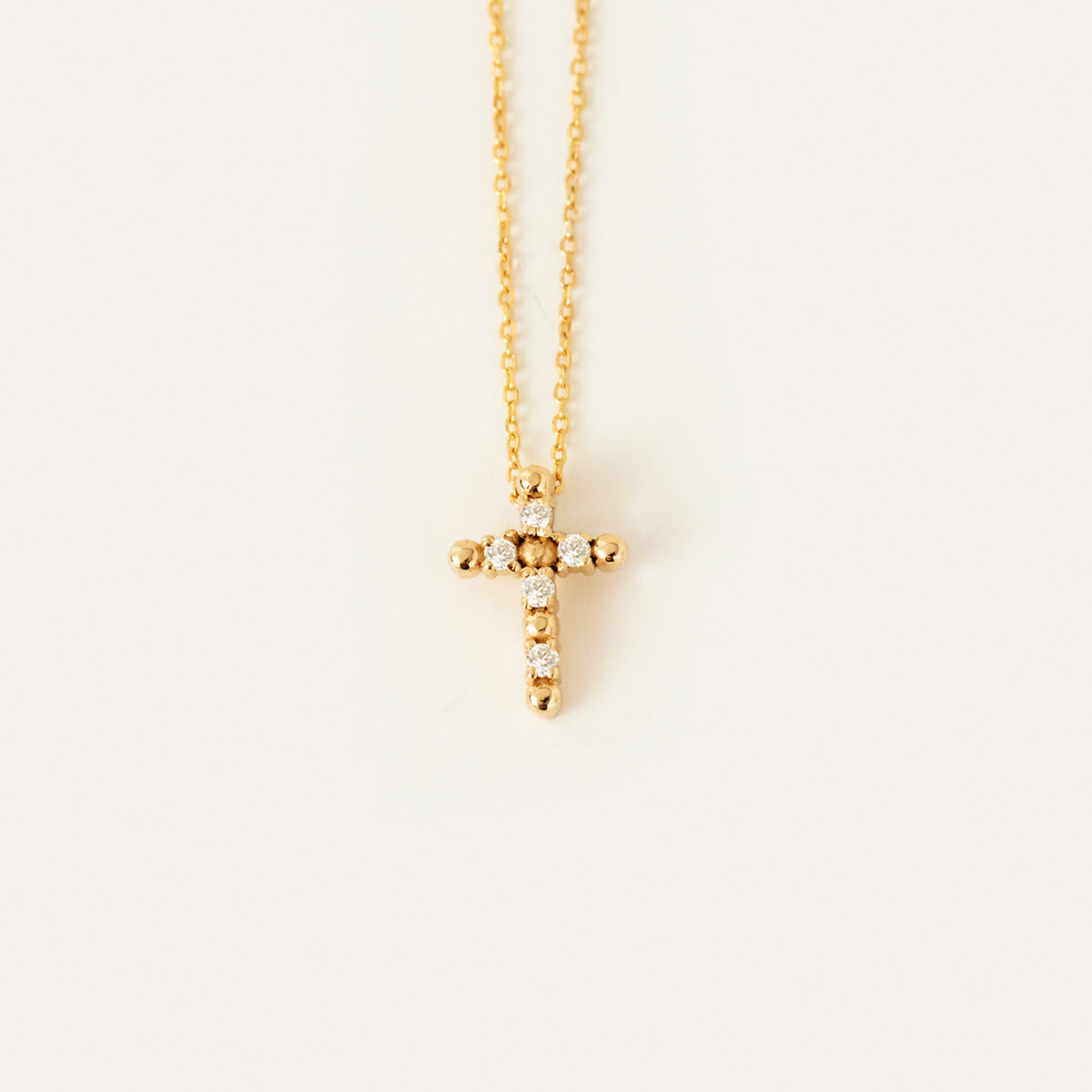 Collier croix de perles et diamants en or 585