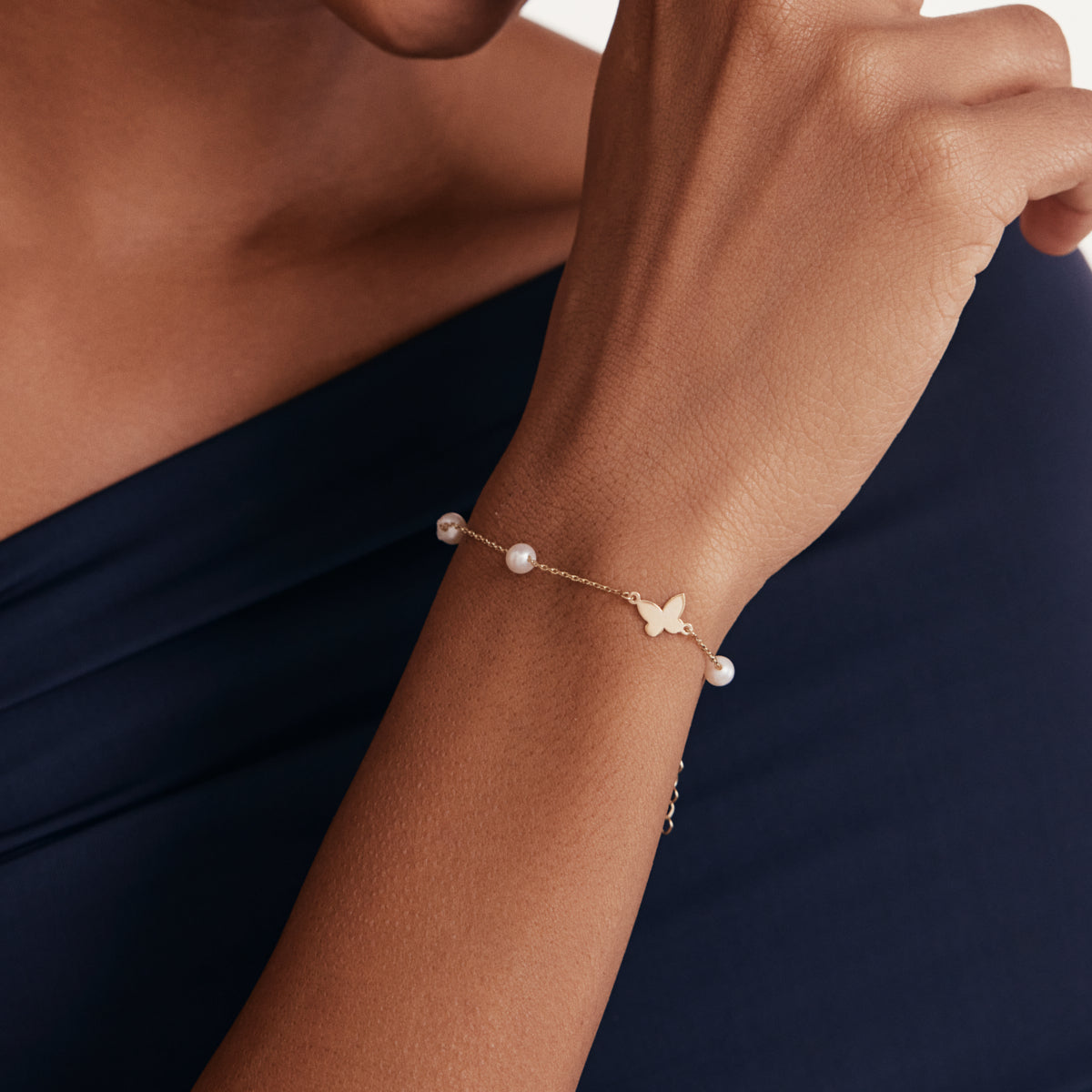 Pearl and butterfly bracelet made of 585 gold