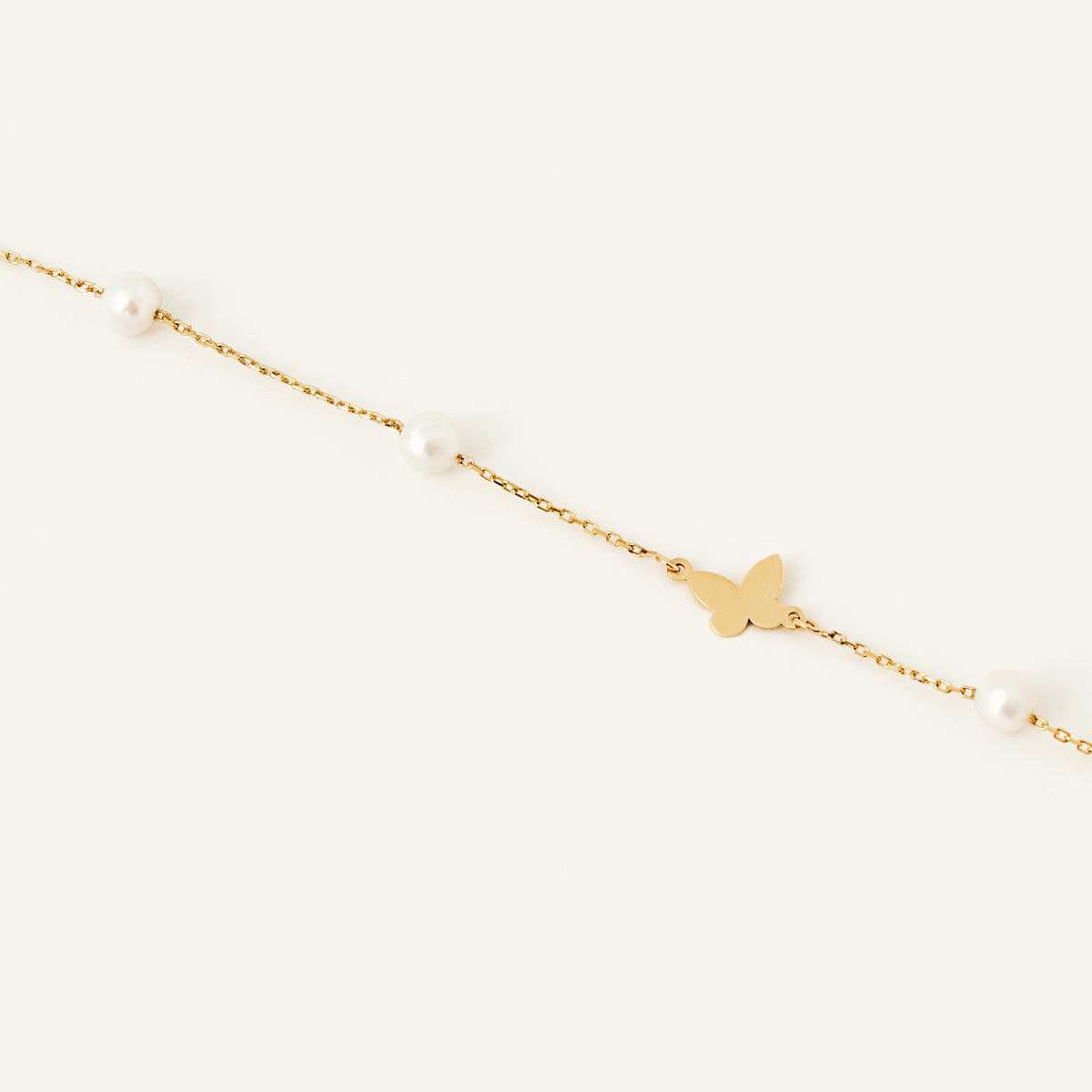 Pearl and butterfly bracelet made of 585 gold