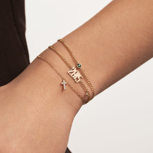 Bracelet à breloques croix diamant en or massif 585
