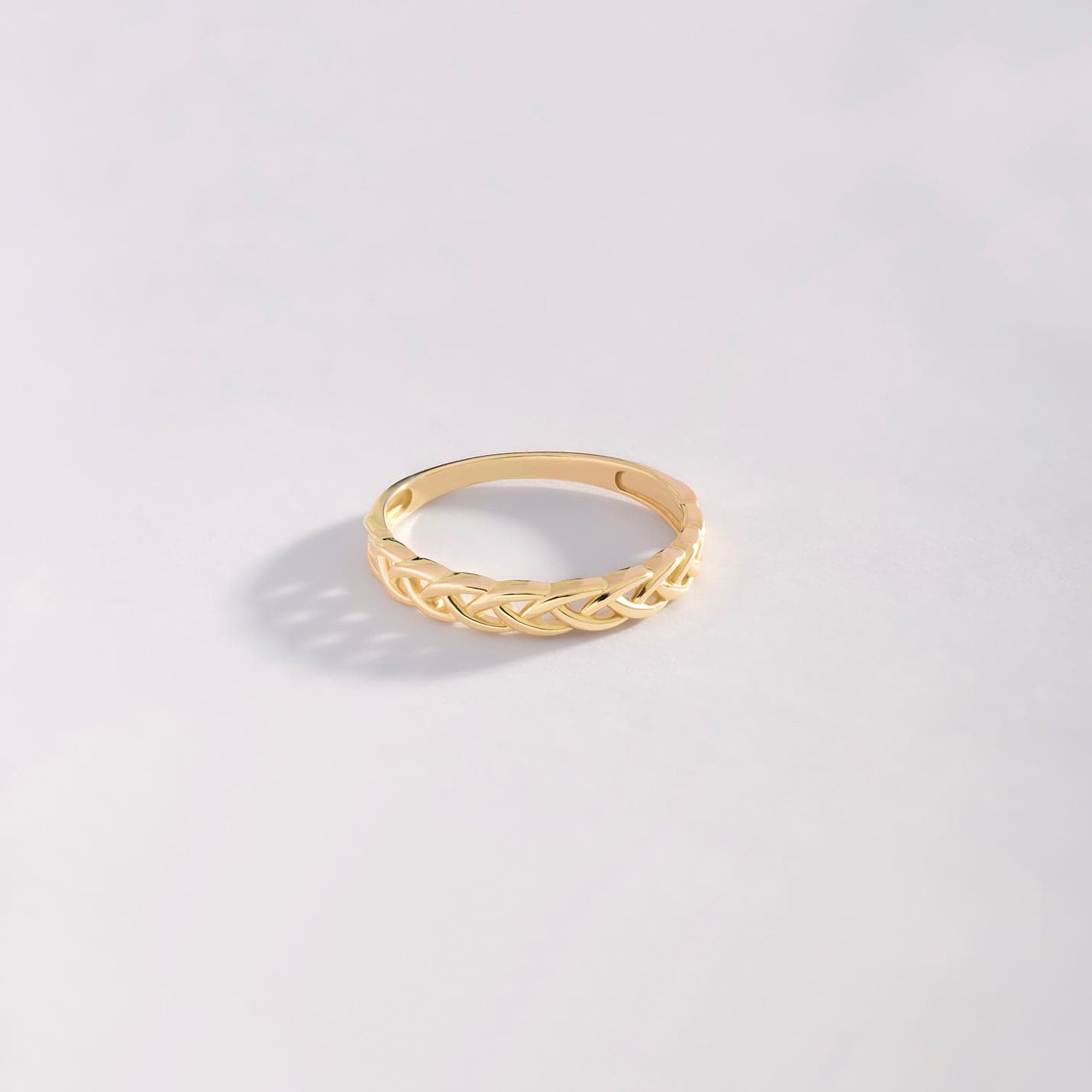 Bague bandeau torsadé en or massif 585