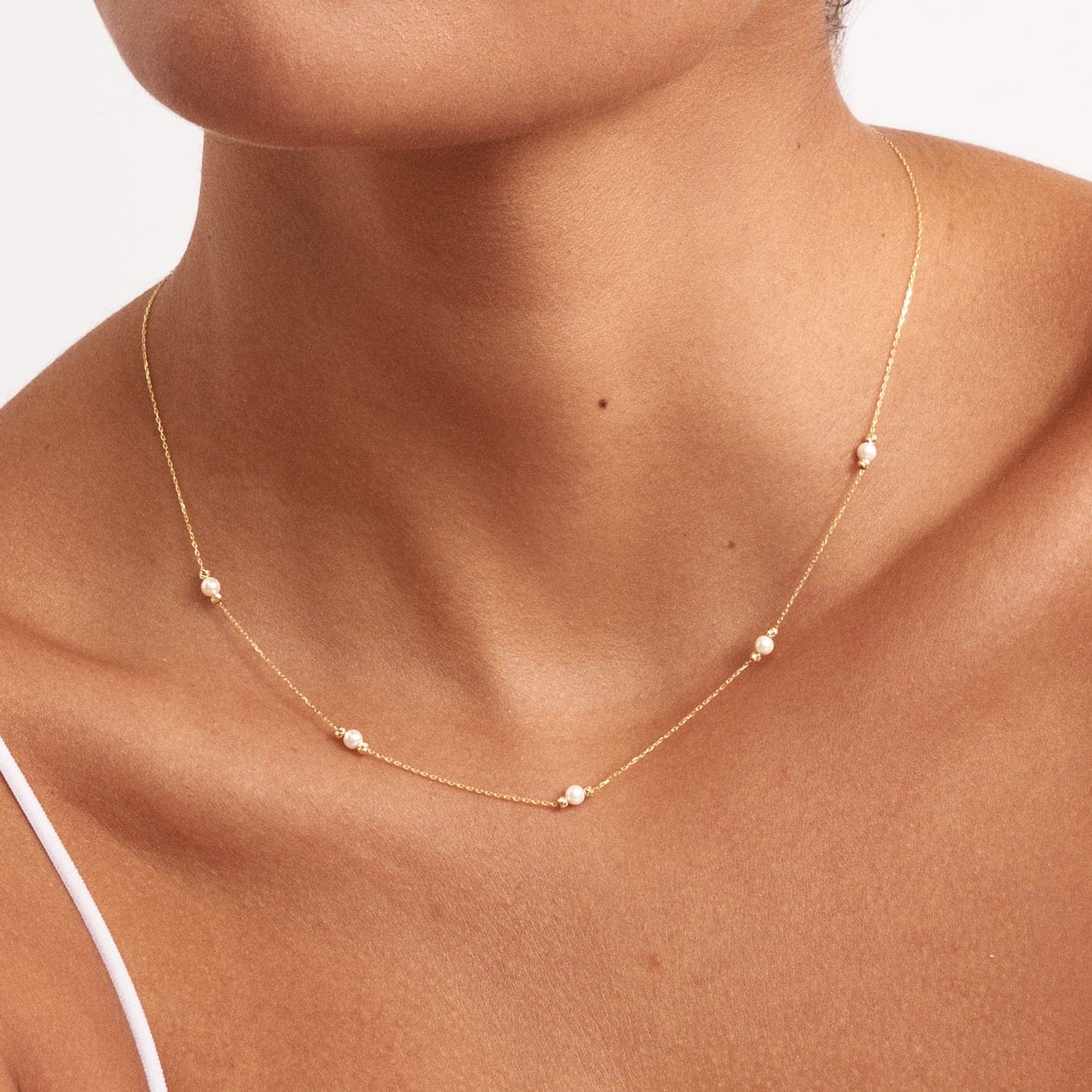 Pearl station necklace made of 585 solid gold