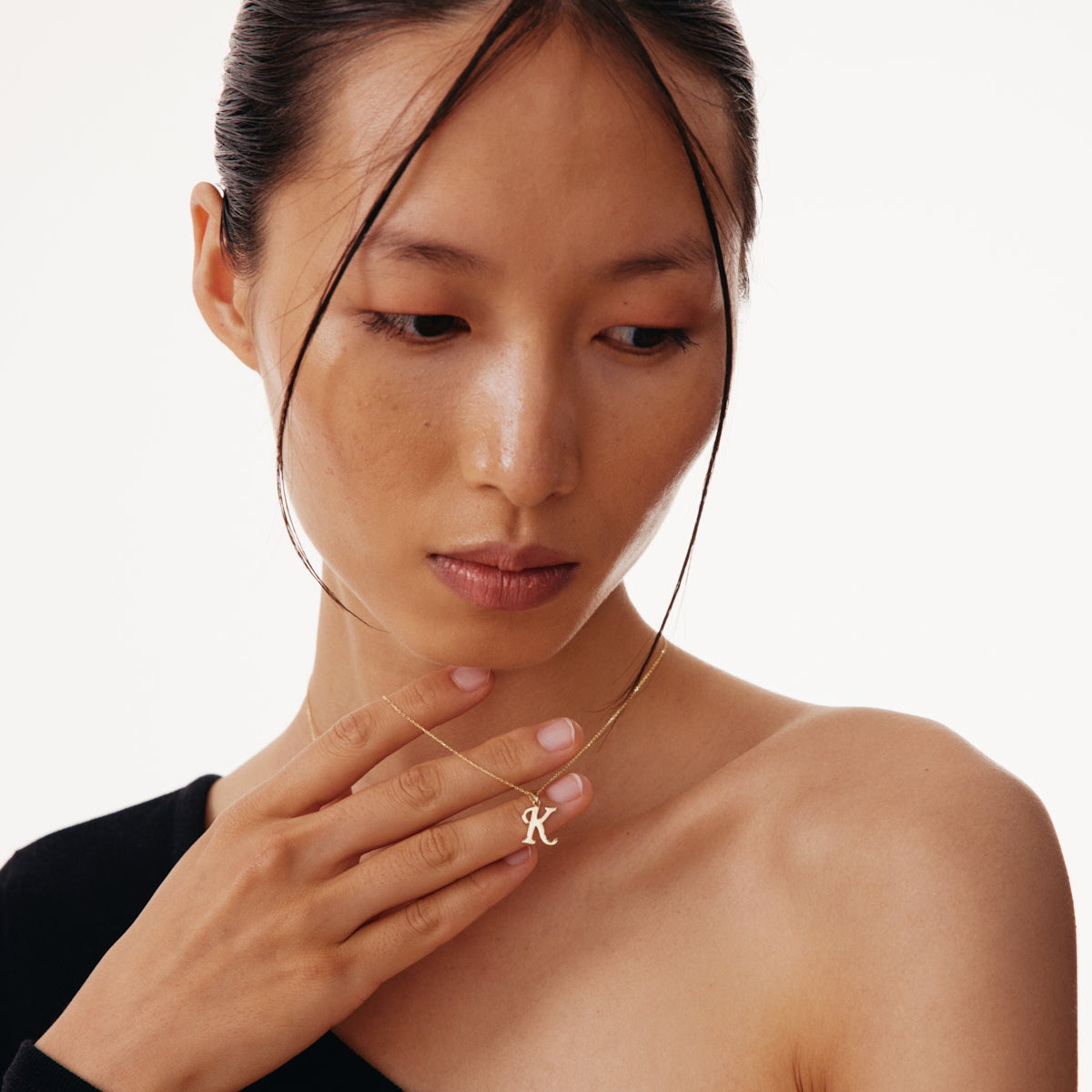 Halskette mit zierlichem Buchstaben-Anhänger