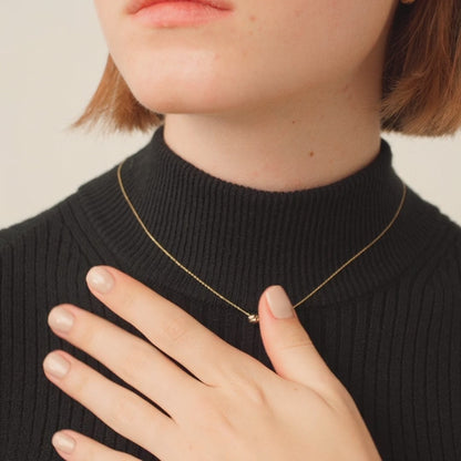 Collier pendentif à trois perles en or 585